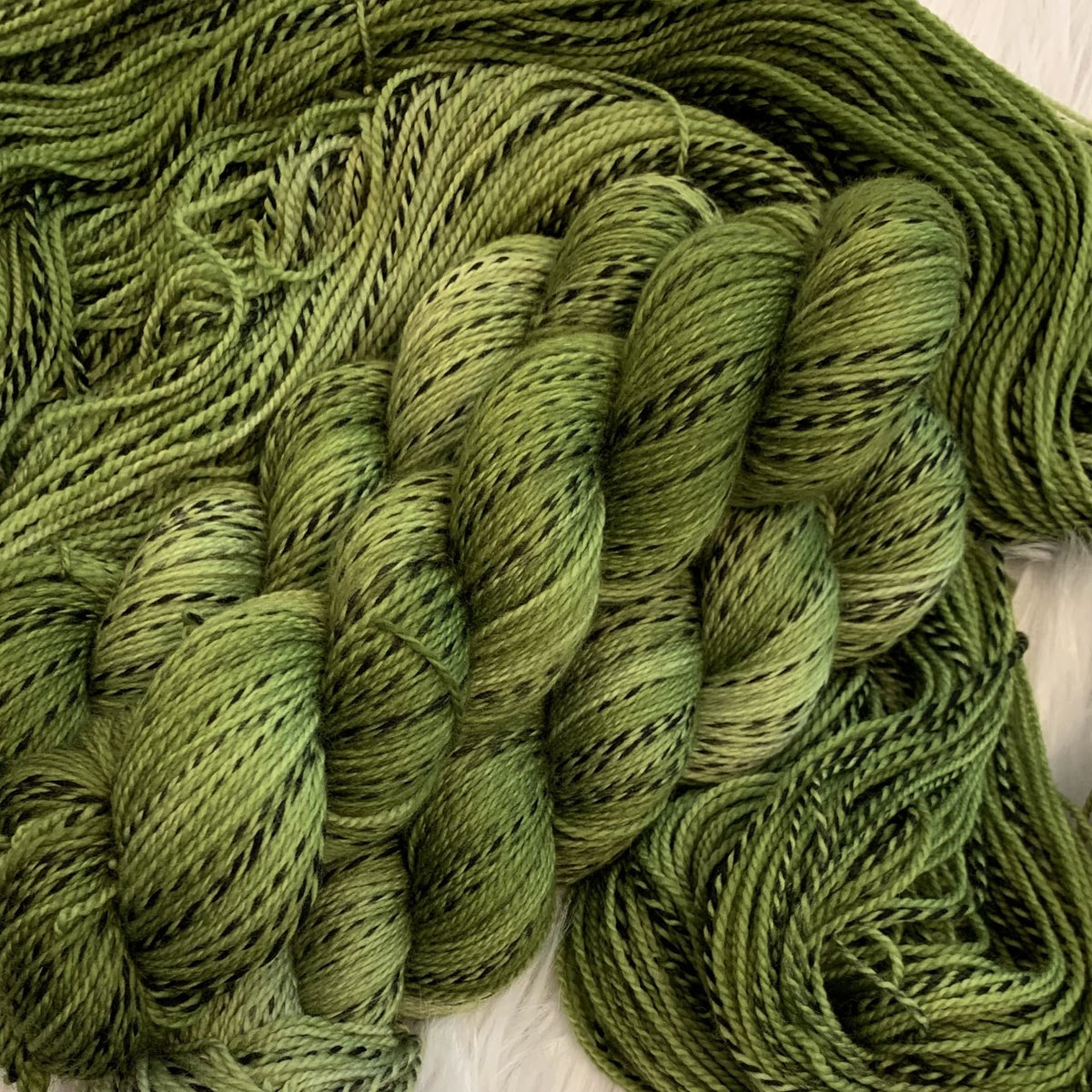 Wild SKUG – Serial Knitters Yarn Shop